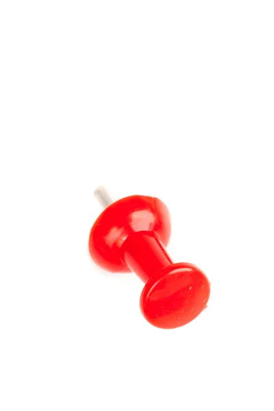 Close-up de um empurrador vermelho perfurado na parede — Fotografia de Stock