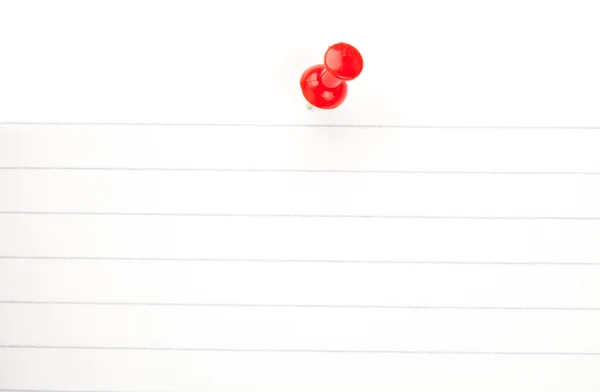 Red pushpin with a white paper — Stock Photo, Image