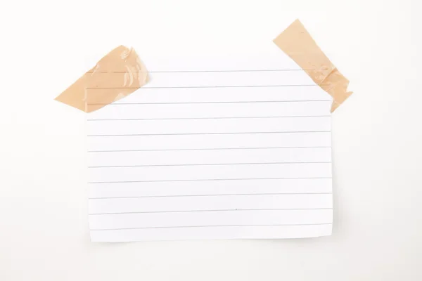 Blank page with adhesive tape — Stok fotoğraf