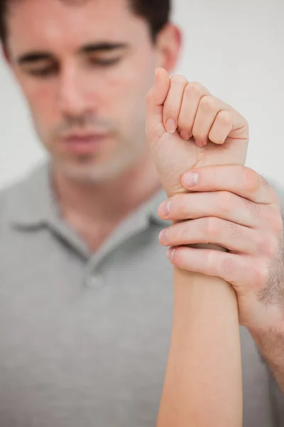 Close-up of a hand being stretched — Stock Photo, Image