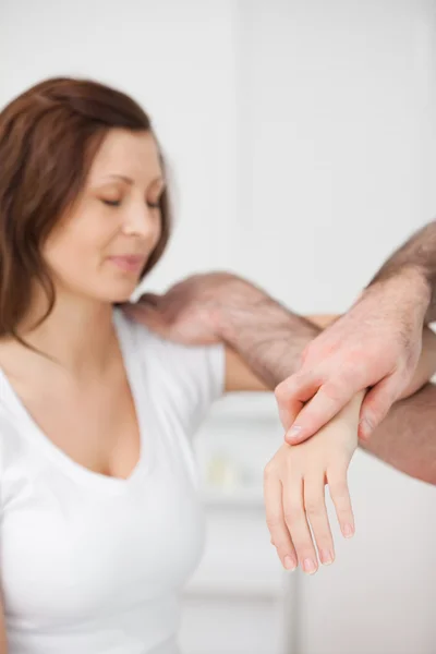 Peaceful patient being examined by a doctor — Stock Photo, Image