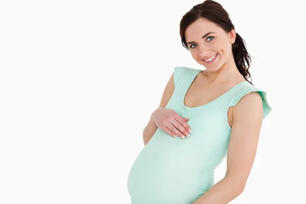 Mujer embarazada sonriendo — Foto de Stock