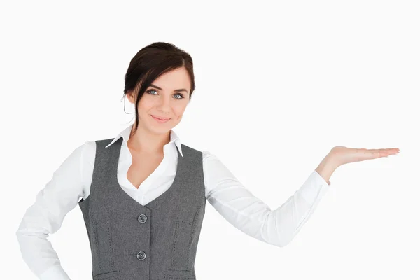 Beautiful businesswoman with her palm facing up — Stock Photo, Image