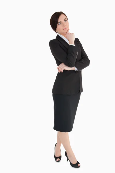 Woman in black suit thinking — Stock Photo, Image