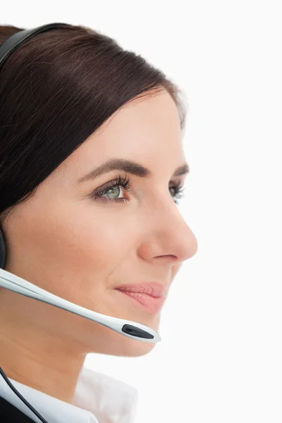 Mujer de ojos verdes con auriculares — Foto de Stock