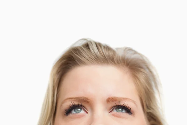 Cheerful blonde woman looking up — Stock Photo, Image