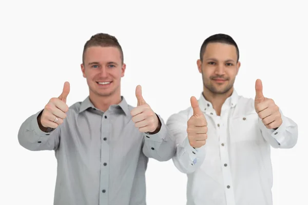 Dois homens a levantar os polegares. — Fotografia de Stock