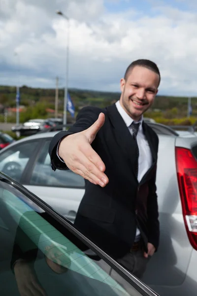 Businessman wanting to shake the hand of someone — Stock Photo, Image