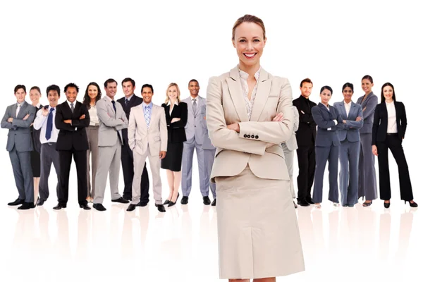 Businesswoman standing up in foreground Royalty Free Stock Photos