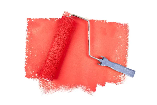 Rodillo de pintura sobre rastros rojos — Foto de Stock