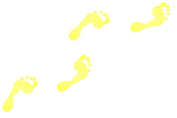 Quatro pegadas amarelas — Fotografia de Stock