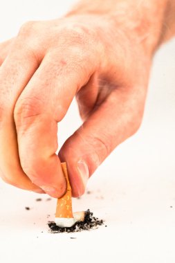 Hand extinguished a cigarette clipart