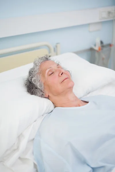 Patient sleeping on a bed — Stock Photo, Image