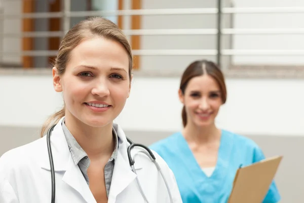 Nurse and a doctor standing Royalty Free Stock Photos