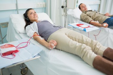 Two smiling blood donors clipart