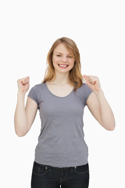 Happy woman clenching one's fists — Stock Photo, Image