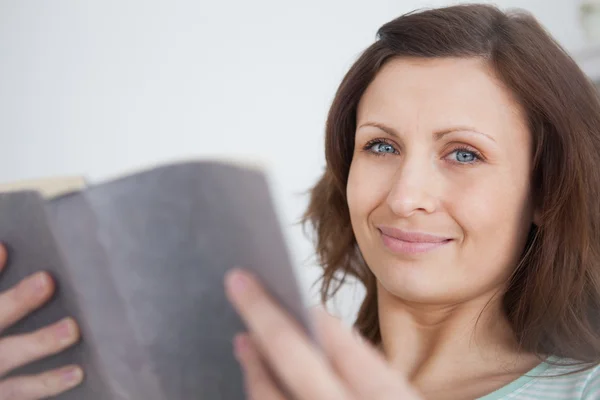 Woman holding a book — Stock Photo, Image