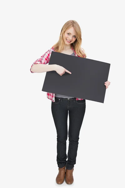 Woman showing a black board — Stock Photo, Image