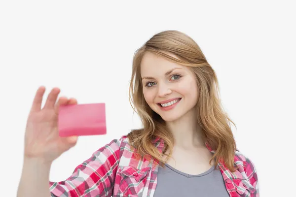 Woman holding a loyalty card — Stock Photo, Image