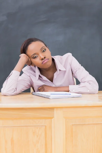Sad black woman at desk — Stock Photo, Image