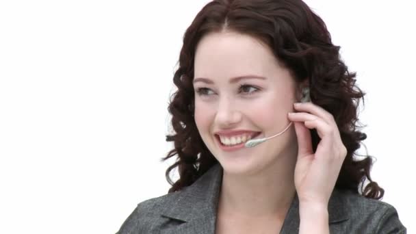 Female employee on a headset — Stock Video