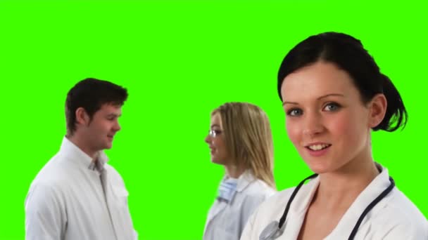 Filmagem em tela verde de uma equipe médica — Vídeo de Stock
