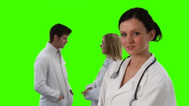 След медицинской бригады на зеленом экране — стоковое видео