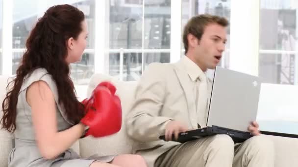 Young businesswoman punching her colleague — Stock Video