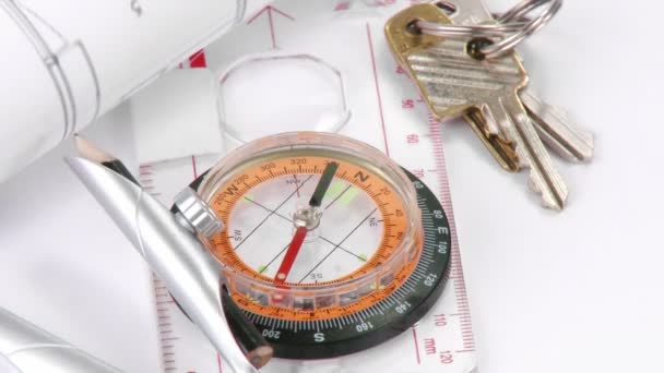 Blueprints, compass and keys turning — Stock Video