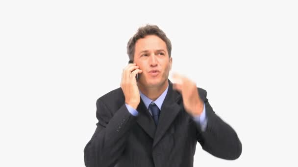 Empresario teniendo una disputa por teléfono — Vídeo de stock