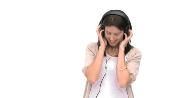 Closeup of a woman listening to music — Stock Video