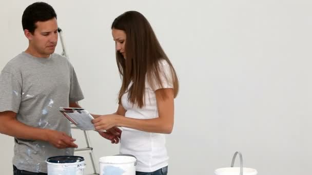 Man comforting his unhappy wife who has a headache — Stock Video