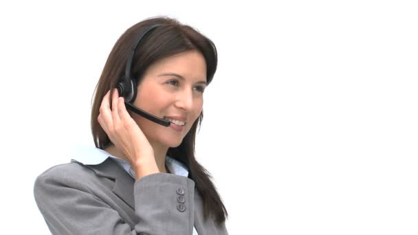 Businesswoman talking on a headset — Stock Video