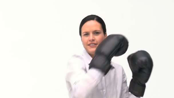 Smiling businesswoman boxing towards the camera — Stock Video