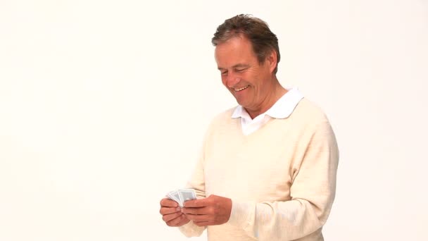 Mature man holding cards — Stock Video