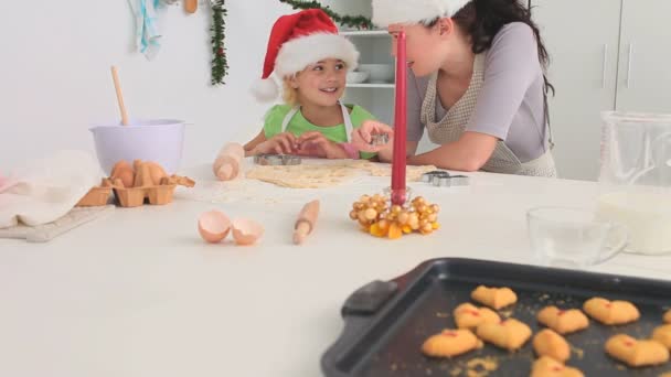 Mother and daughter cooking together — Stock Video