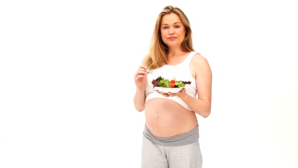 Pregnant woman holding a salad — Stock Video