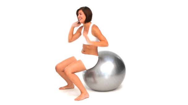 Cute brunette on a gym ball — Stock Video