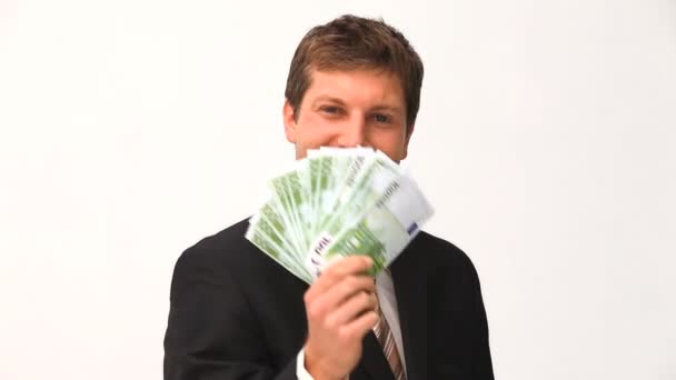 Young businessman proud of what he earned — Stock Video