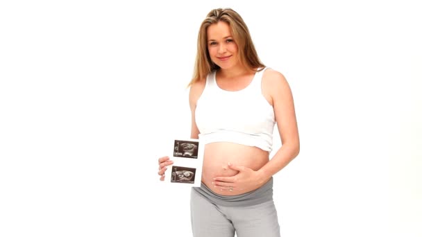 Femme enceinte tenant un scan — Video