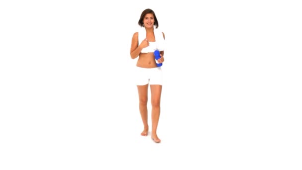 Brunette ins sportswear drinking water — Stock Video