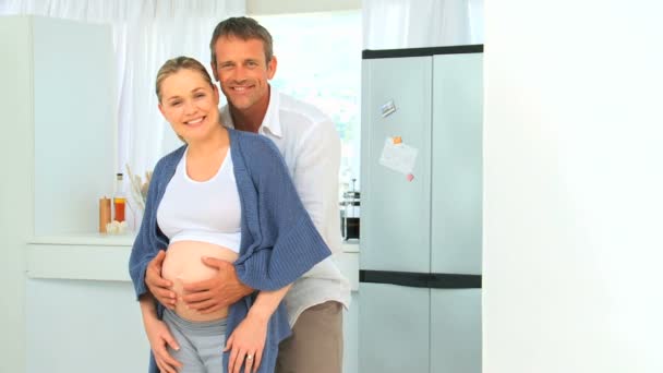 Lovely future parents looking at the camera — Stock Video