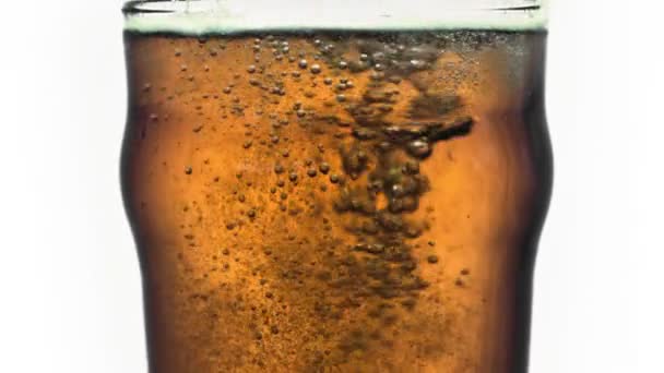 Beer pouring into pint in super slow motion — Stock Video