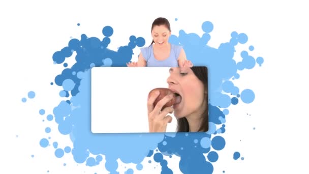 Γυναίκα που δείχνει μια γυναίκα τρώει ένα μήλο — Αρχείο Βίντεο