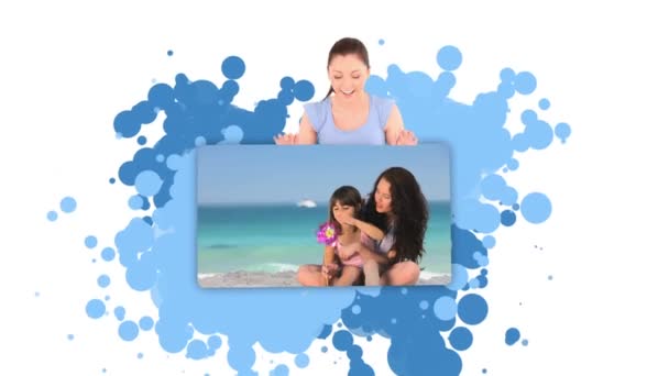 Woman showing a woman and her daughter — Stock Video