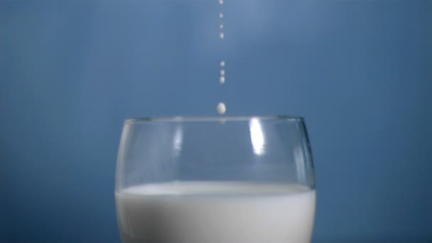 Droplet of milk falling in super slow motion — Stock Video