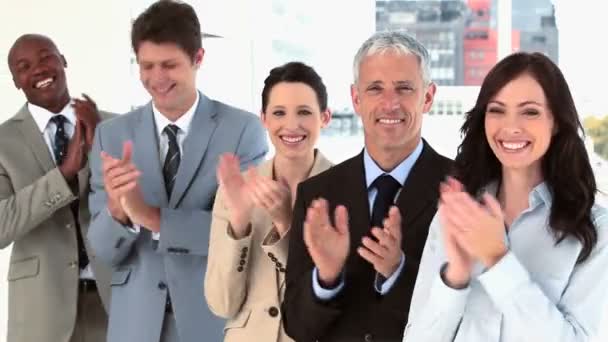 Happy business team applauding together — Stock Video