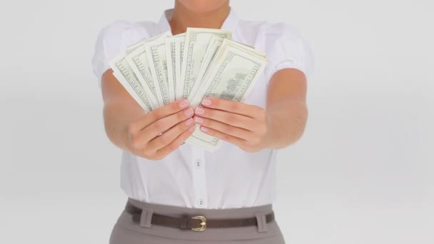 Businesswoman holding a fan of dollars — Stock Video