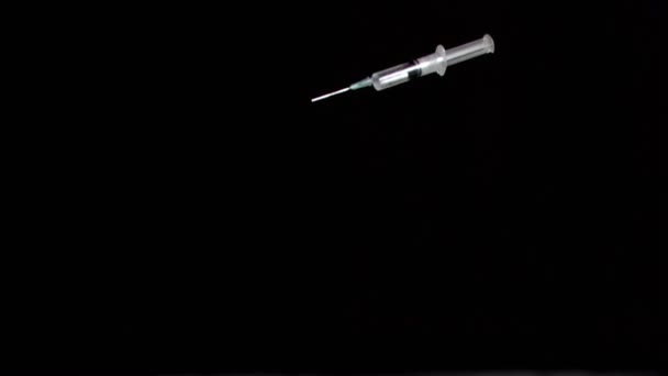 Syringe in super slow motion falling on floor — Stock Video