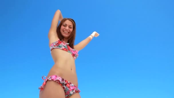 Girl happily dancing in her bikini — Stok video